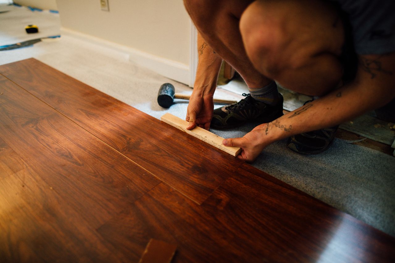 Flooring installer at work